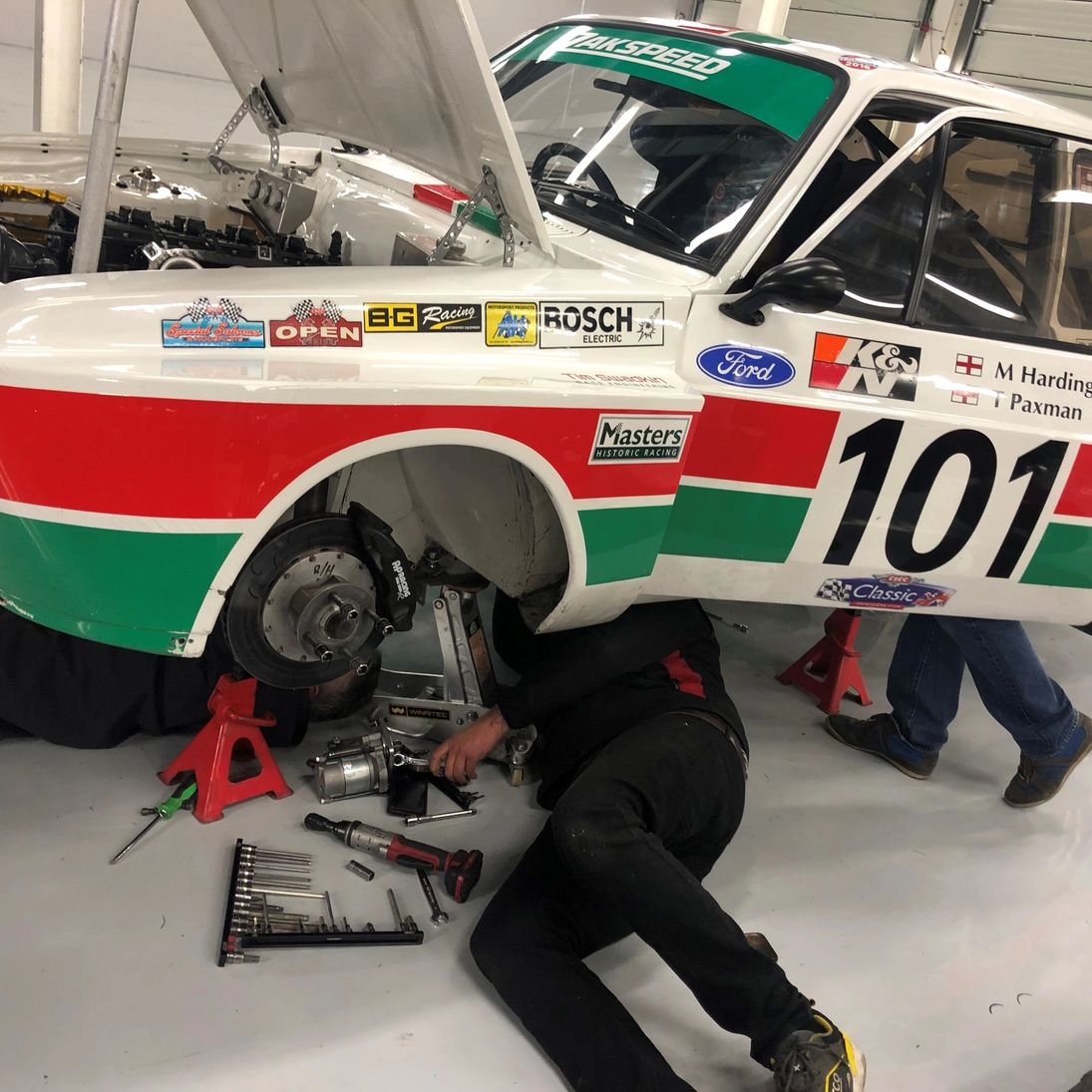 Mechanic working on a Zakspeed Escort race car